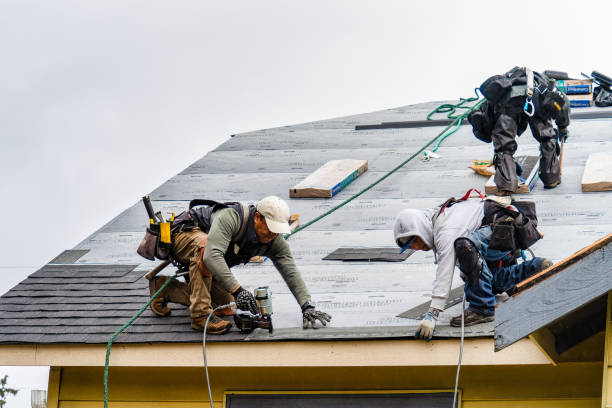 Professional Roof Replacement technician working in Dorset, OH